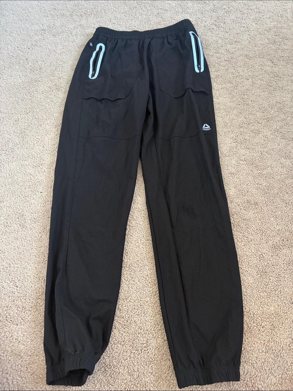 Reebok Black Joggers with Light Blue Zip Accents